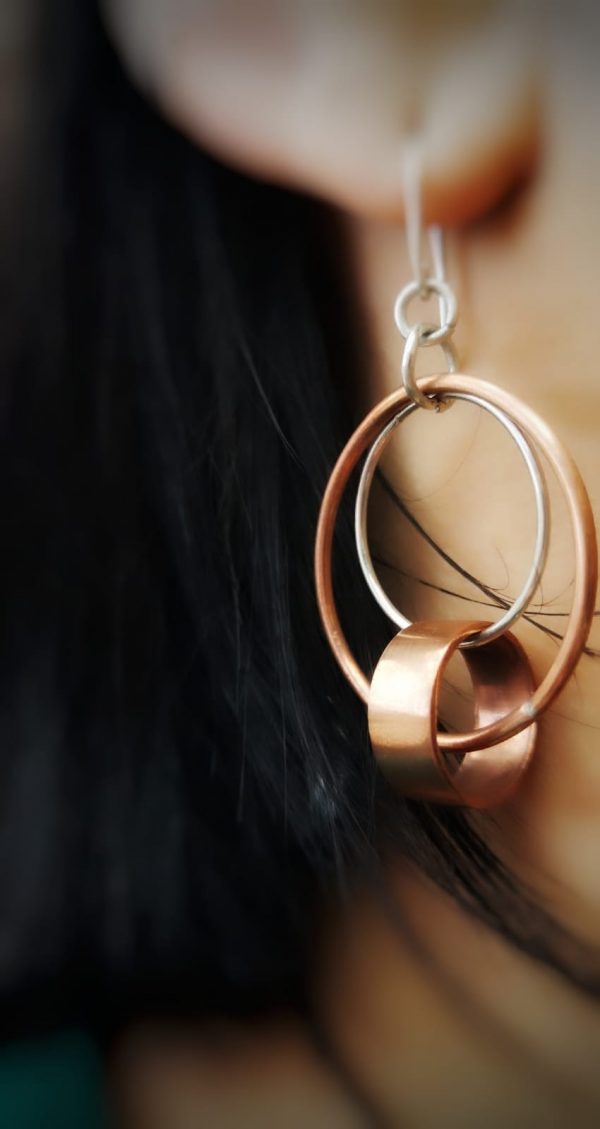 earring on womans ear - double hoop earrings