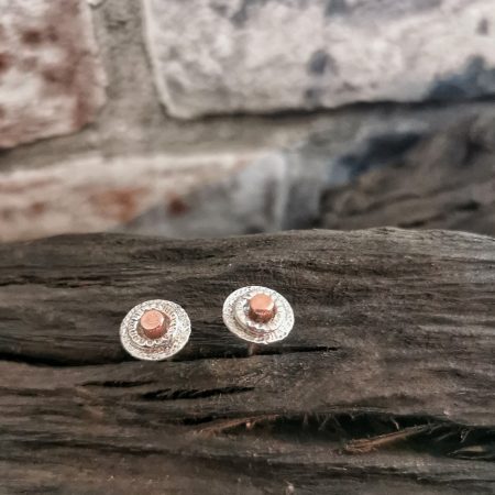 Stud earrings on bog oak - handmade sterling silver circle stud earrings