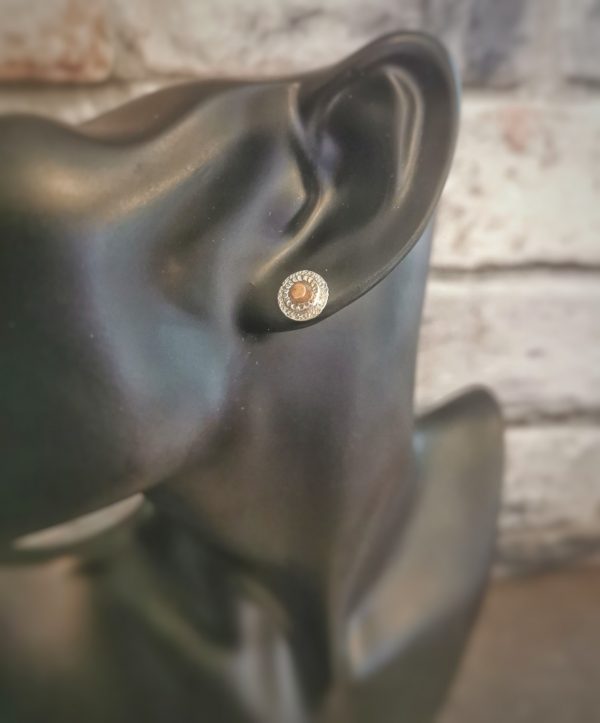 stud earring on plastic head model - handmade sterling silver circle stud earrings