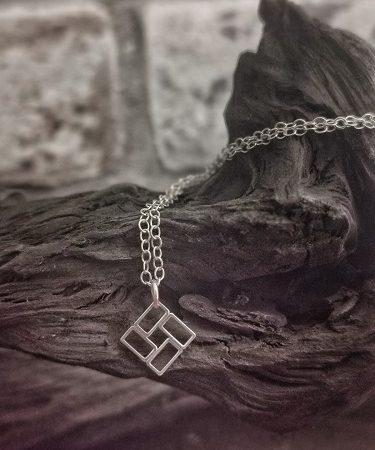 necklace on bog oak - sterlng silver windmill necklace