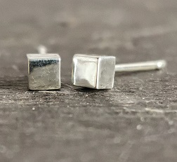 stud earrings on black slate - cube sterling silver stud earrings