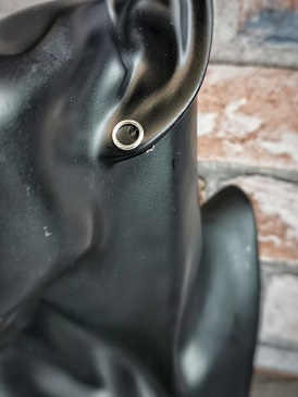 stud earrings onblack plastic manikin - minimal circle stud earrings