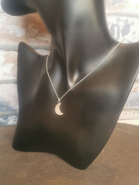 necklace on black plastic manikin - handmade moon necklace
