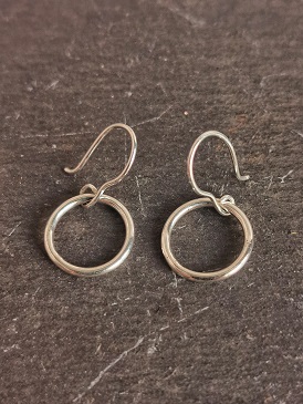 earrings displayed on black slate - classic circle earrings