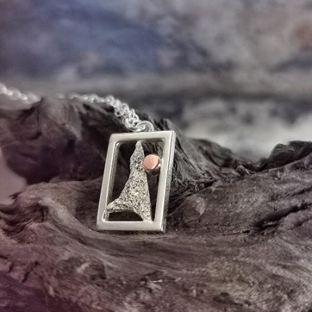 necklace displayed on bog oak - Handmade morning sunrise sterling silvernecklace