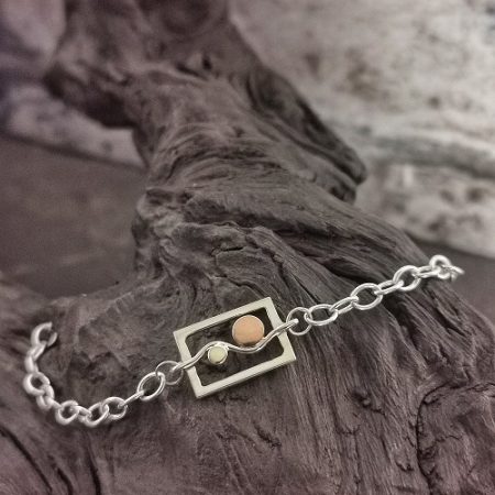 bracelet displayed on bog oak - Sun and Moon handmade bracelet