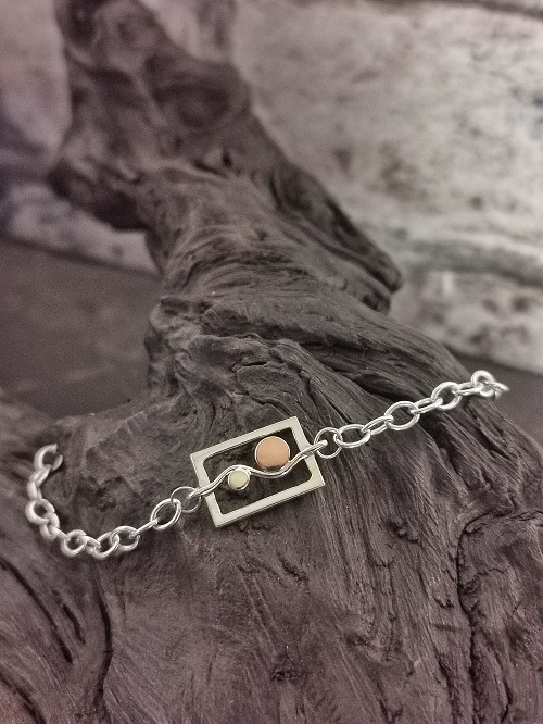 bracelet displayed on bog oak - Sun and Moon handmade bracelet