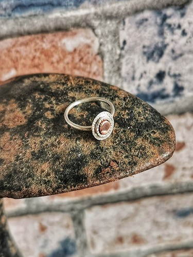 ring displayed on a cobblers last - steling silver concentric ring