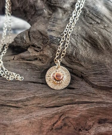 necklace on bog oak - sterling silver concentric cirlce necklace